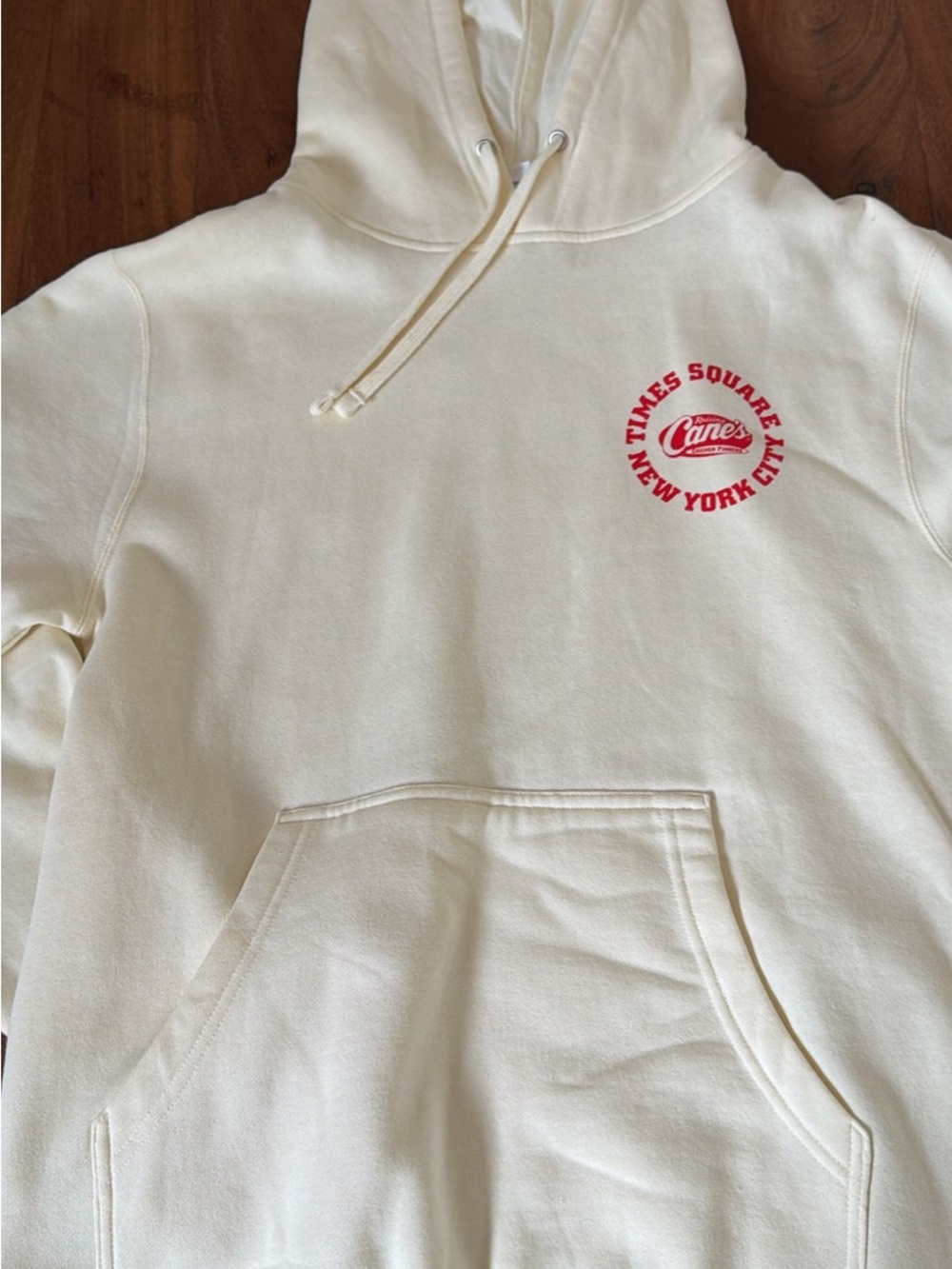 Raising Cane’s Cream Times Square Cares Logo Crewneck Hoodie